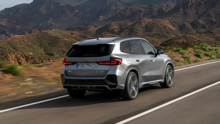 BMW X1 xDrive30e 2023. Desktop wallpaper