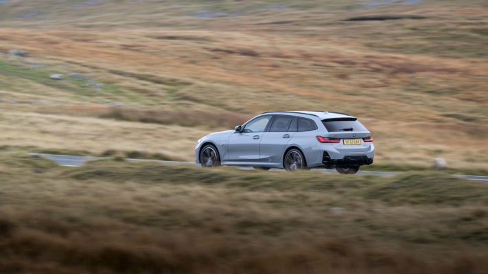 BMW 330e xDrive Touring UK Version 2023. Desktop wallpaper